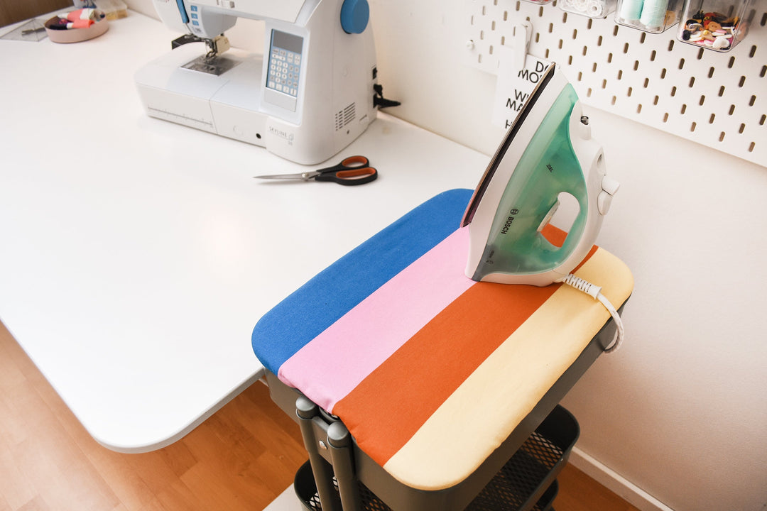 Make a mini ironing board and cover with IKEA stuff